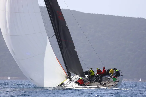 stock image Bodrum,Turkey. 12 March 2023: Sailboats sail in windy weather in the blue waters of the Aegean Sea, on the shores of the famous holiday destination Bodrum.