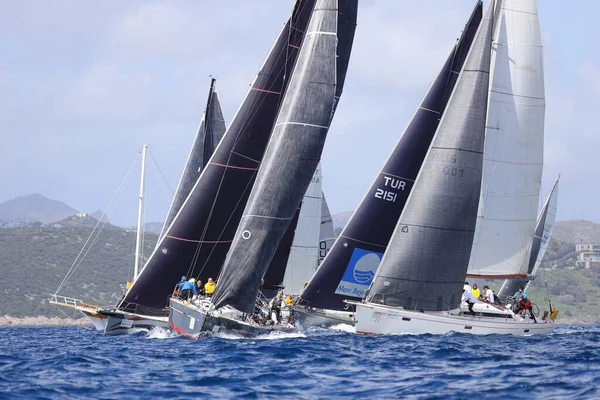 stock image Bodrum,Turkey. 12 March 2023: Sailboats sail in windy weather in the blue waters of the Aegean Sea, on the shores of the famous holiday destination Bodrum.