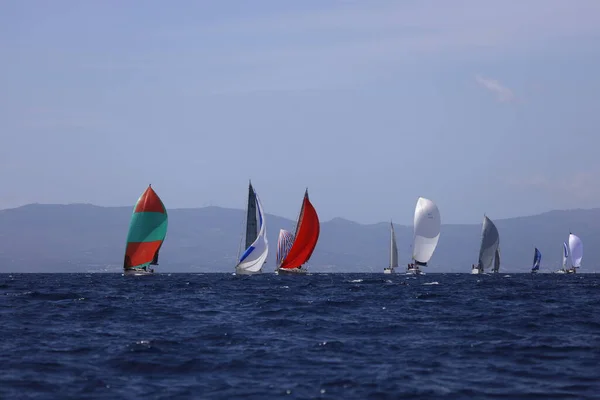 stock image Bodrum,Turkey. 01 April 2023: Sailboats sail in windy weather in the blue waters of the Aegean Sea, on the shores of the famous holiday destination Bodrum.