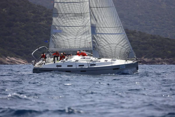 stock image Bodrum,Turkey. 01 April 2023: Sailboats sail in windy weather in the blue waters of the Aegean Sea, on the shores of the famous holiday destination Bodrum.