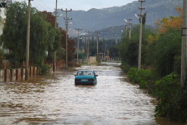 stock image Bodrum, Mugla, Turkey. January 02, 2014: Heavy rain that fell on the popular holiday resort Bodrum created a small-scale flood. some houses and cars on the roads got stuck in the flood water.