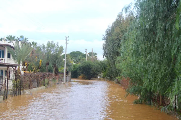 stock image Bodrum, Mugla, Turkey. January 02, 2014: Heavy rain that fell on the popular holiday resort Bodrum created a small-scale flood. some houses and cars on the roads got stuck in the flood water.