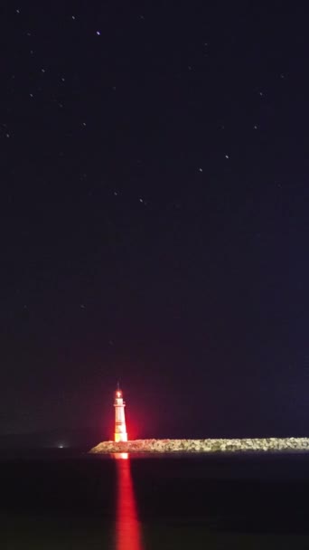 Beach Stars Guiding Lighthouse Accompanying Star Trails Dark Night Vertical — Wideo stockowe