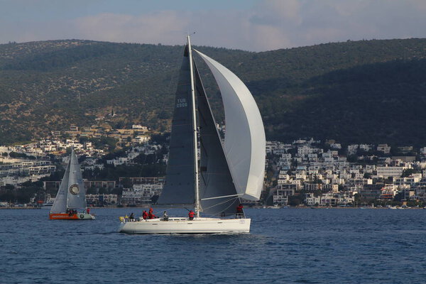 Bodrum,Turkey. 09 February 2019: Sailboats sail in windy weather in the blue waters of the Aegean Sea, on the shores of the famous holiday destination Bodrum.