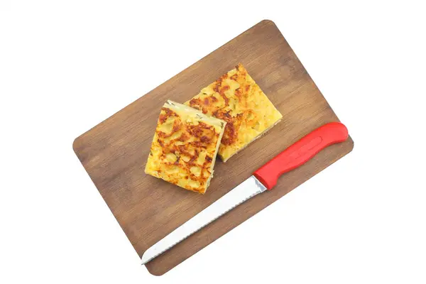 Stock image Slices of baked Round Borek cheese pie in kitchen tray with herbs. White background. Top view. Copy space