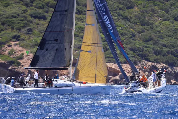 stock image Bodrum,Turkey. 25 May 2024: Sailboats sail in windy weather in the blue waters of the Aegean Sea, on the shores of the famous holiday destination Bodrum.