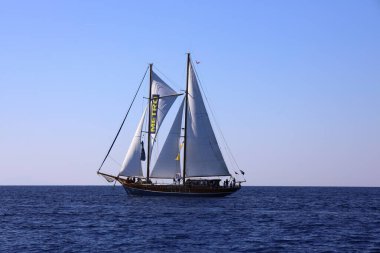 Bodrum, Turkey, 23 October 2024: Bodrum Sailing Cup, Gulet Wooden Sailboats and sailing yachts racing. clipart