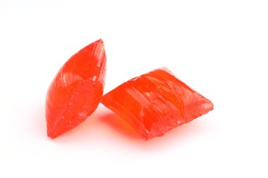 Beyaz arka planda kırmızı şeker. Ramazan Bayramı Şekeri.