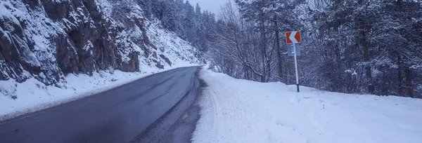 Beautiful snowy road in winter landscap