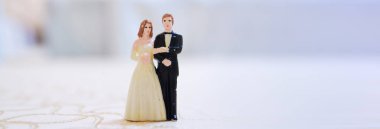 Tüm arka planda düğün bebekleri.