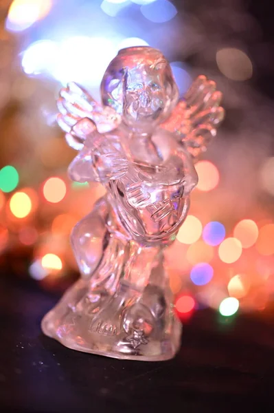 stock image christmas decoration, glass angel on blurred bokeh background