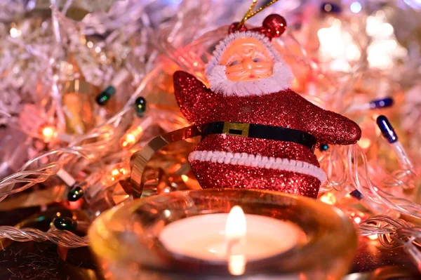 Tarjeta Navidad Con Santa Claus Juguete Vela —  Fotos de Stock