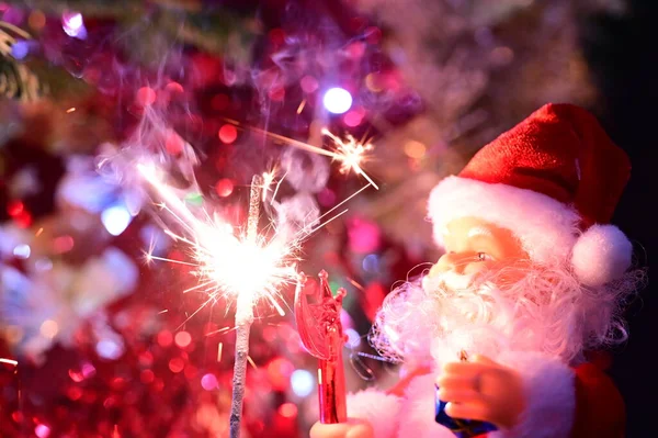 Santa Claus Toy Sparkler Holiday Christmas Background — Stock Photo, Image