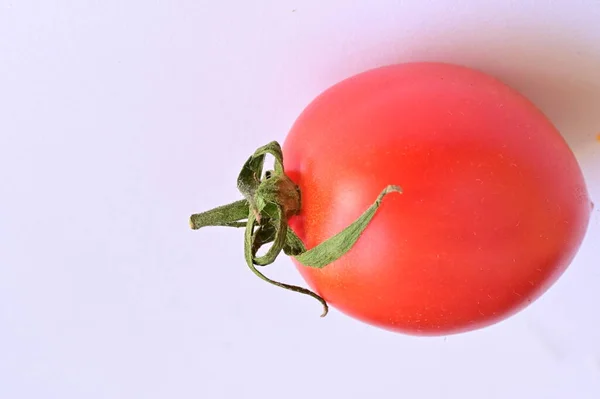 tomatoes and tomato on white background