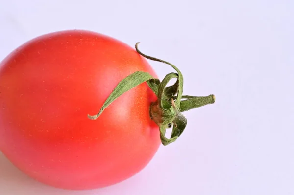 tomatoes and tomato on white background