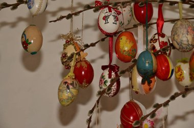 colorful easter eggs on  willow twig 