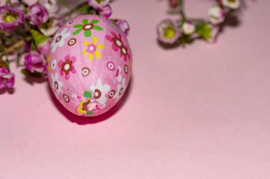 holiday composition of   flowers and  easter egg, close up