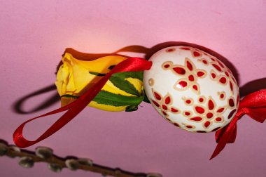 willow branch, rose  flower and  easter egg 