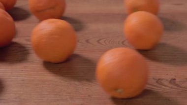 Oranges on wooden table  , agricultural occupation , healthy eating
