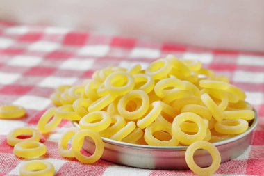 Dried  durum wheat semolina pasta  Anelli siciliani , Sicilian rings , small ring -shaped pasta  used for oven-baked dishes  , preparing food , traditional italian food clipart