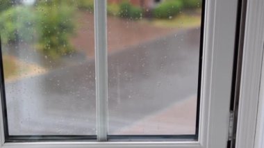  Heavy rain window view in England UK.