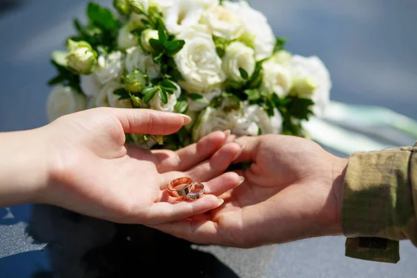 Hand Guy Military Uniform Holds Hand Girl Wedding Rings Background Лицензионные Стоковые Фото
