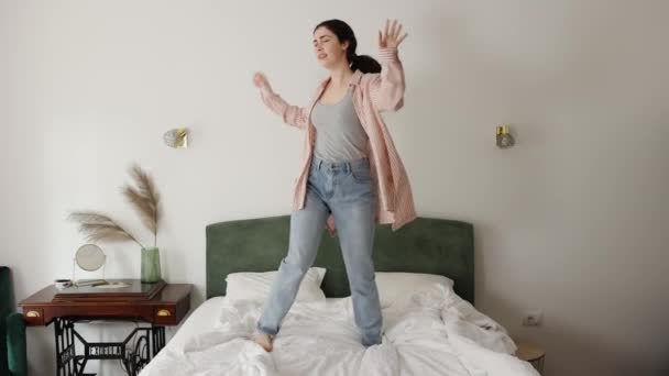 Happy Young Caucasian Woman Funny Dancing Bed Slow Motion Concept — Stockvideo