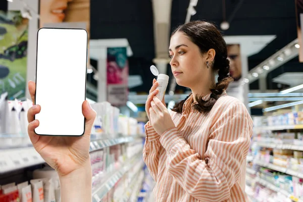 Portrait Caucasian Woman Holds Cream Tube Sniffs Fragrance Products Choice — Fotografia de Stock