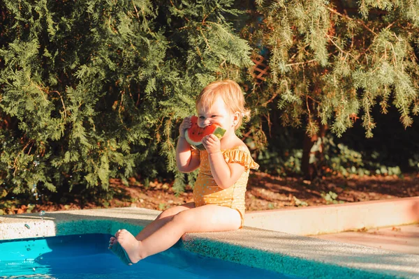 Cute Caucasian Baby Girl Yellow Swimsuit Eats Slice Watermelon Appetite — Foto de Stock
