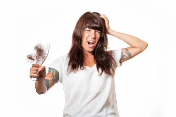 Blurred Portrait Tattooed Woman Holds Comb Her Hair Pulled Out — 스톡 사진