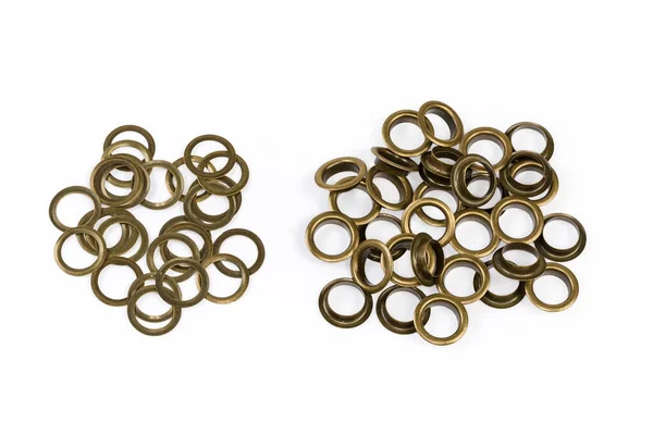 Twee Hopen Van Metalen Mouwen Ringen Als Oogjes Componenten Voor — Stockfoto