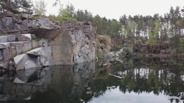 Forest Lake Steep Rocky Shores Springtime Aerial View — Video Stock