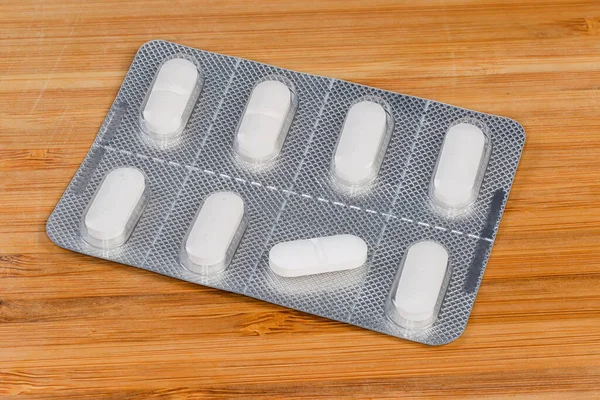 Pillole Bianche Tutto Blister Una Stessa Pillola Separatamente Una Superficie — Foto Stock