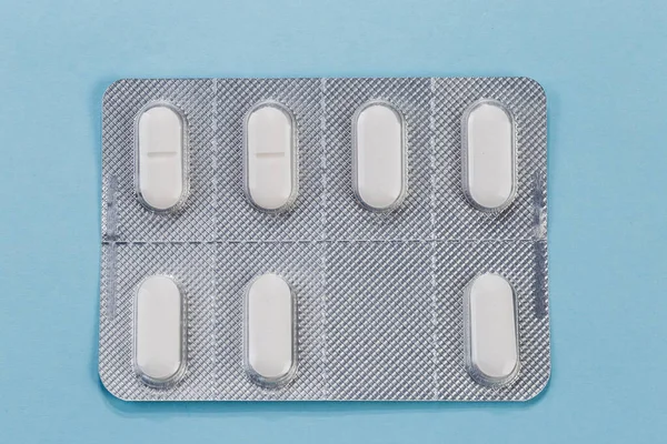 Envase Blíster Completo Con Píldoras Oblongas Blancas Del Medicamento Superficie —  Fotos de Stock