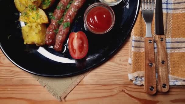 Serving Grilled Thin Long Sausages Baked Potatoes Different Sauces Black — Stock Video
