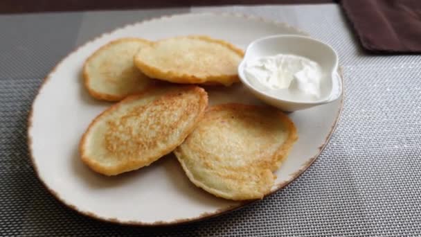 Fried Potato Pancakes Sour Cream Dish Table — Stock Video