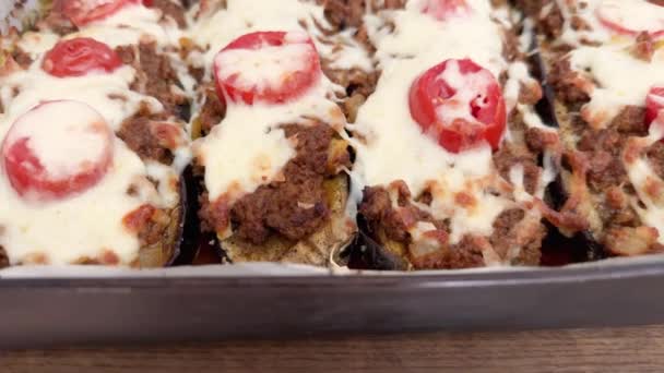 Eggplant Halves Baked Minced Meat Grated Cheese Tomatoes — Stock Video