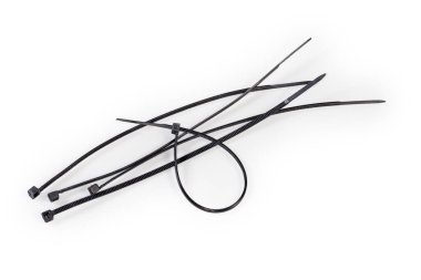 Several black unfastened and one fastened single-use nylon cable ties on a white background clipart