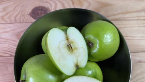 Two Halves Whole Green Apples Stainless Steel Bowl — Stock Video