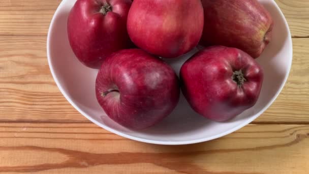 Red Apples White Bowl Rustic Table — Stock Video