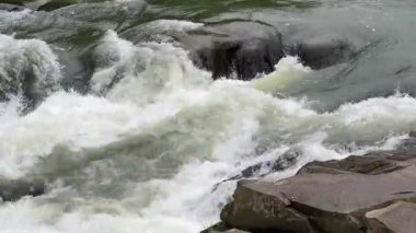 Water flow in Probiy waterfall on Prut River in Carpathians