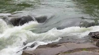 Beginning of Probiy waterfall on Prut River in Carpathians