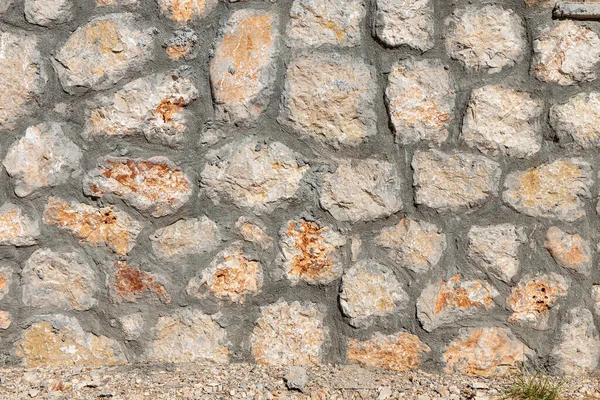 Μια Όμορφη Υφή Ενός Παλιού Τοίχου Από Πορτοκαλί Πέτρες Ρωγμές — Φωτογραφία Αρχείου