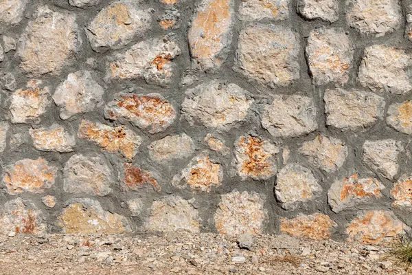 Μια Όμορφη Υφή Ενός Παλιού Τοίχου Από Πορτοκαλί Πέτρες Ρωγμές — Φωτογραφία Αρχείου