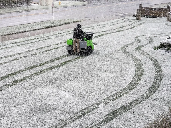 Man Riding Lawn Fertilizer Spreader Snow Storm — Stock Photo, Image