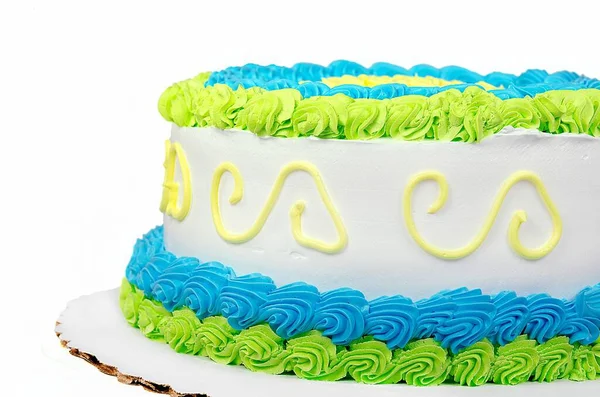 Schichtkuchen Mit Grünem Und Blauem Zuckerrand Isoliert Auf Weiß — Stockfoto