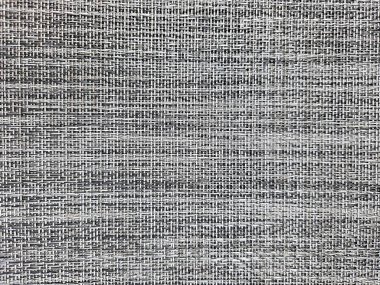 Siyah ve gümüş kumaş tuval arkaplanının yakın çekimi