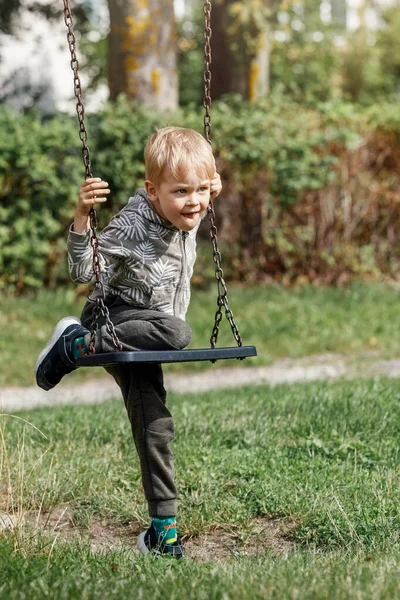 Little Self Sufficient Boy Tries His Best Climb Chain Swing — Stock Photo, Image