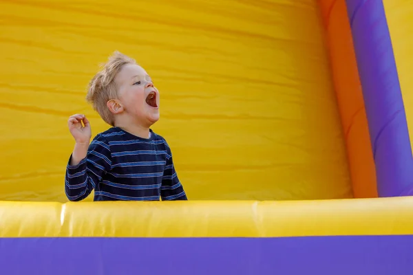 Little Boy Having Fun Inflatable Castle Playground Child Naughty Shouts — Stock Photo, Image