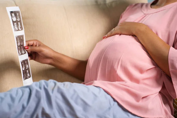 Close Shot Indian Pregnant Woman Sofa Looking Ultrasound Scan Report — Stock Photo, Image